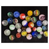 Assorted Marbles in Various Conditions