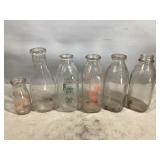 Variety of Milk Bottles