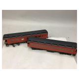 Possibly Two Toy Train Kit Cars