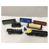 Assorted Atlas & Arnold Toy Train Cars
