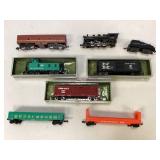 Assorted Aurora Postage Stamp Toy Train Cars