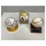 Three Commemorative Baseballs in Displays
