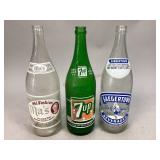 Three Vintage Glass Advertisement Bottles