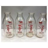 Four Vintage Hart Dairy Glass Bottles