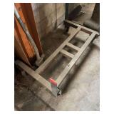 Metal cart with casters. Approximately 4‘ x 2‘