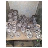 Shelf of black pipe fittings