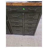 Military style industrial workbench heavyduty steel cabinet base with wooden top. With contents.