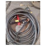 heavy-duty electrical cable assembly, commonly used for welding (as a welding lead or ground clamp cable) or as a high-amperage power cable (such as for a generator).