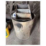 Shop trash can full of floor sweep