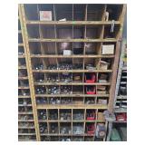 Shelf with contents. Cotter pins nuts and washers.