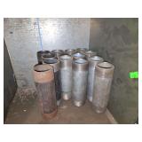 Shelf of black/ galvanized pipe fittings