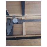 lot contains a long-range dial caliper, commonly used in machining, woodworking, in a wooden case.