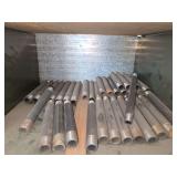 Shelf of black/ galvanized pipe fittings