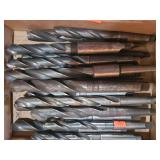 1 lot containing different sized tapper shank carbon steel drill bits.
