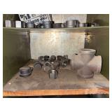 Cubby of galv/black pipe fittings