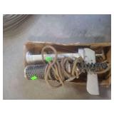 1 lot containing vintage electric immersion heater or a radiant heating element, similar in style to portable heater, caulking gun.