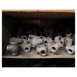 Cubby of galv/black pipe fittings