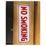No smoking sign and Gates metal signs