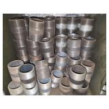 Shelf of black/ galvanized pipe fittings