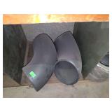 Shelf of black pipe fittings