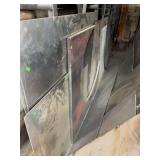 Large assortment of sheet metal, diamond plate and grated metal sheets and remnants.