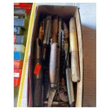 Box of assorted end mill cutters.