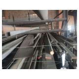 Industrial metal stock, likely steel/galvanized misc lengths of metal.