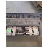 1 metal box containing various sized drill bits