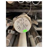 One piece of 3 11/16”x8’ solid round steel.