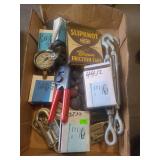 1 lot containing a tubing flailing tool, 5 gages, 4 steel self locking snap hooks, box of tape