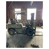 Clark model 500-y80 propane powered forklift. Runs but needs brake work.