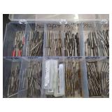 lot contains a plastic case with different sized metalworking taps which is a rotary cutting tool used to create internal threads in pre-drilled holes, such as in metal or plastic.