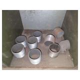 Shelf of black/ galvanized pipe fittings