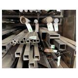 Approximately 20 pieces of various sized square and rectangular tubing ranging from 4’-20’