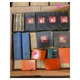 Box of assorted taps.