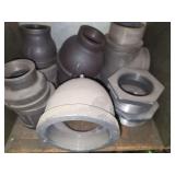 Shelf of black/ galvanized pipe fittings