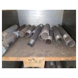 Shelf of black/ galvanized pipe fittings