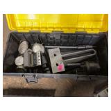 Small black and yellow tool box with metal shop accessories