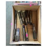 Box of assorted larger thread taps in a bit