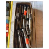 Box of assorted end mill cutters.