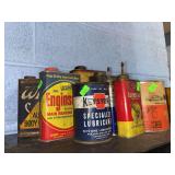 Various cans of mixed lubricants