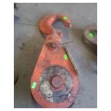 is a McKissick snatch block, a heavy-duty rigging and lifting pulley manufactured by The Crosby Group.