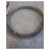 a coil of industrial wire, such as galvanized iron wire, annealed steel wire