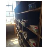 lot contains a 98 by 77 inch wood and metal shelf contents not included