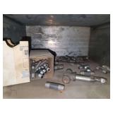 Shelf of black/ galvanized pipe fittings