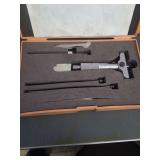 lot contains a Mitutoyo depth micrometer set, a precision measuring tool used by machinists and engineers to measure the depth of holes, slots, and steps.