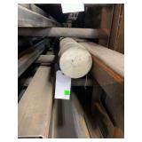 One piece of solid round steel. Approximately 4”x6’