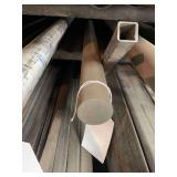 One piece of solid round steel. Approximately 2”x2’