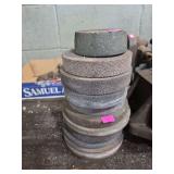 vintage grinding wheels, commonly used with bench grinders or sharpening systems for shaping and sharpening tools.