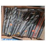 1 lot containing various sized tapper shank carbon steel drill bits.